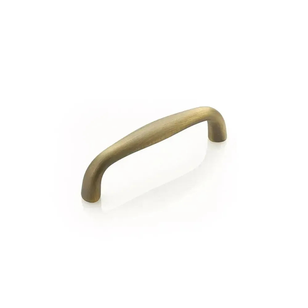 The Schaub Traditional Cabinet Pull in Antique Light Brass finish.