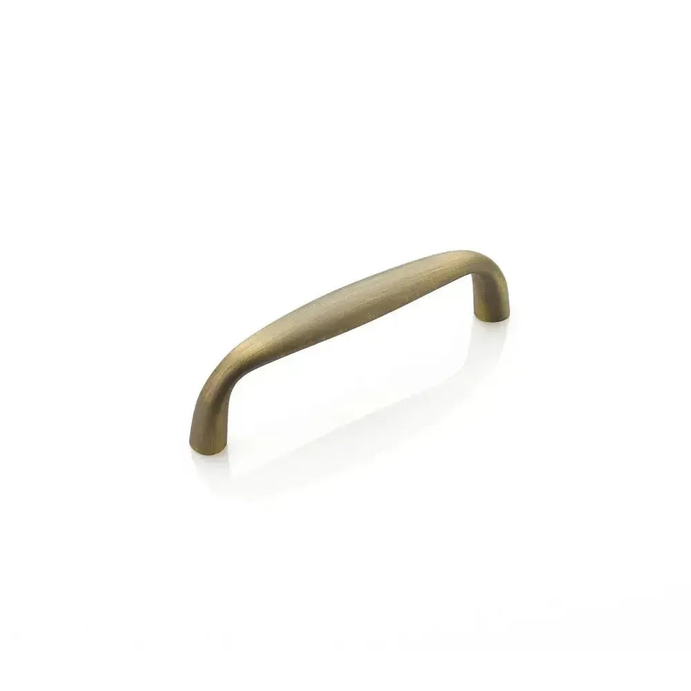 The Schaub Traditional Cabinet Pull in Antique Light Brass finish.