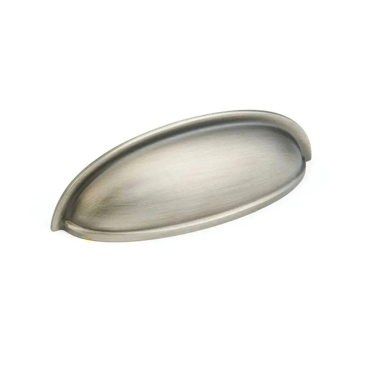 The Schaub Traditional Cup Cabinet Pull in Antique Nickel finish.