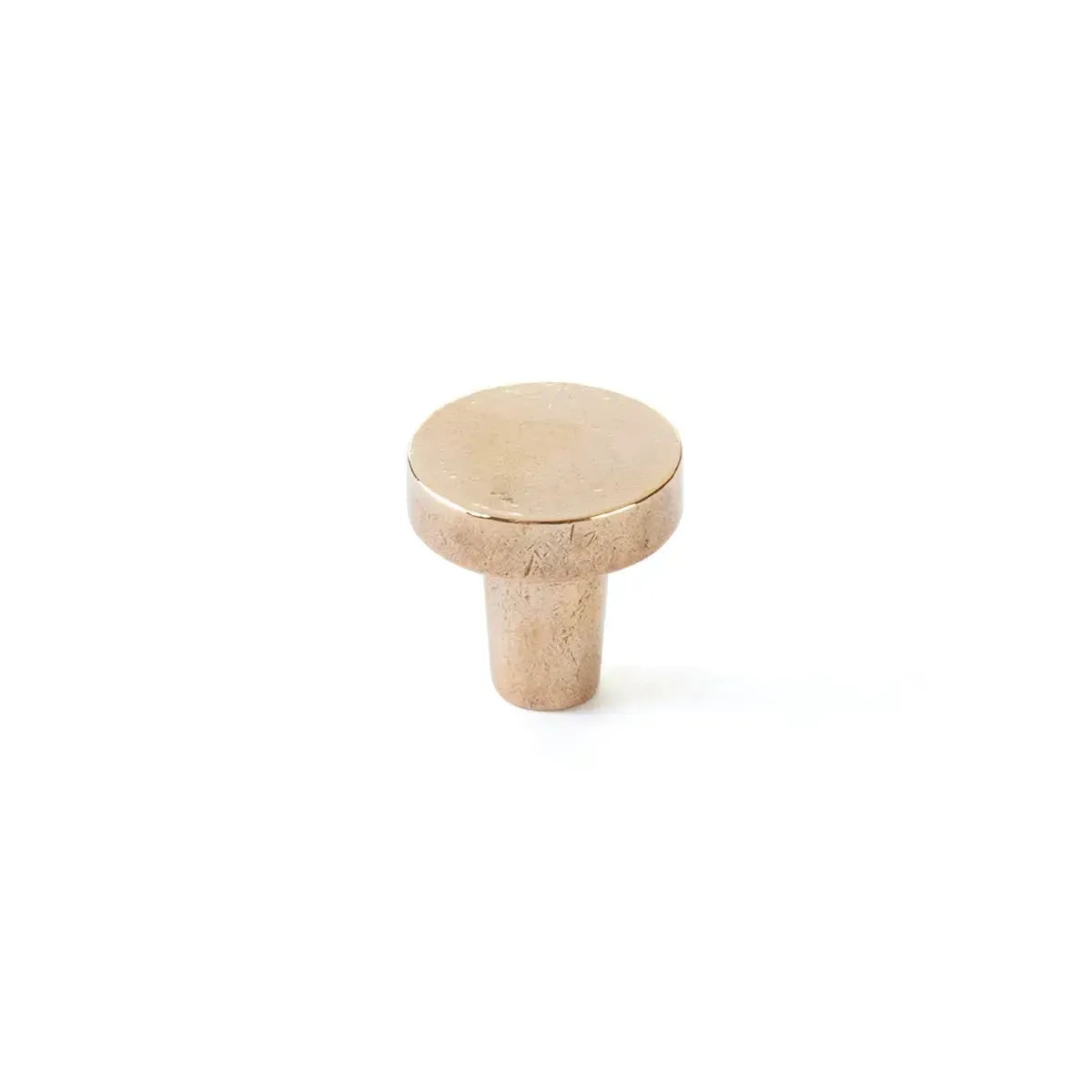 The Schaub Turno Round Cabinet Knob in Natural Bronze finish.