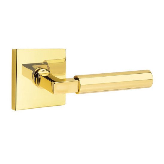 The Emtek Hercules Lever With Square Rosette in Unlacquered Brass finish