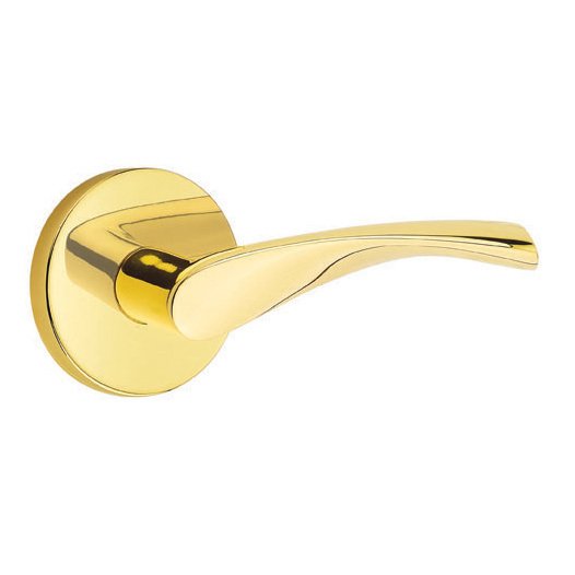 The Emtek Triton Lever With Disk Rosette in Unlacquered Brass finish