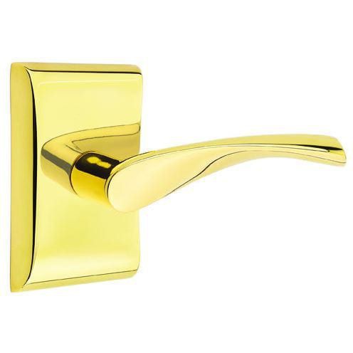 Emtek Triton Lever With Neos Rosette in Unlacquered Brass finish