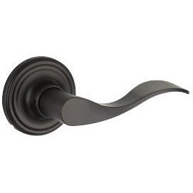 The Yale Expressions Passage Brunswick Lever with Maguire Rosette in Flat Black finish