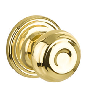 The Yale Expressions Lewiston Knob with Maguire Rosette in Polished Brass finish.