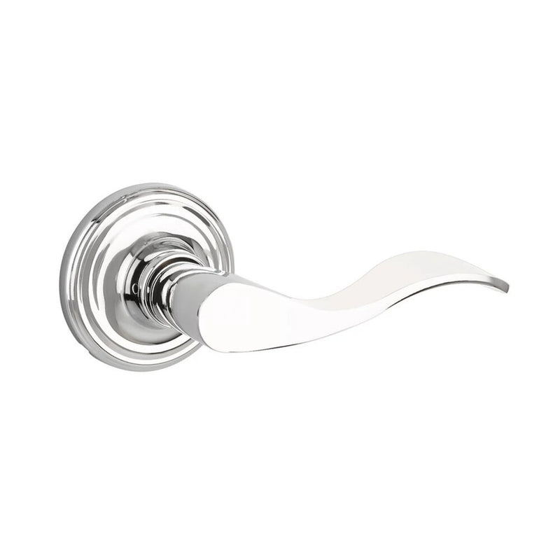 The Yale Expressions Passage Brunswick Lever with Maguire Rosette in Polished Chrome finish.